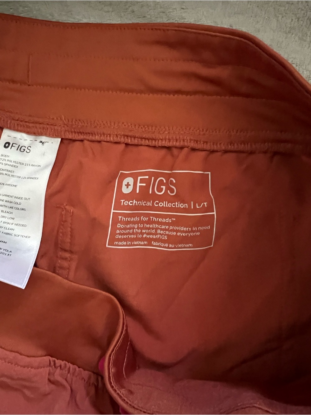 Women’s Figs Straight Orange Cargo Scrub Pants with Pocket Tab - Picture 3 of 3